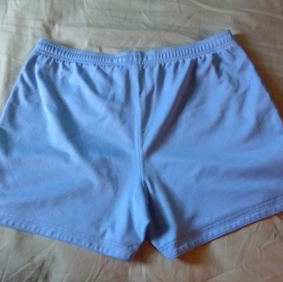 2 pairs Nike activewear shorts - 1 blue white pair, 1 orange pink neon pair - Picture 5 of 7